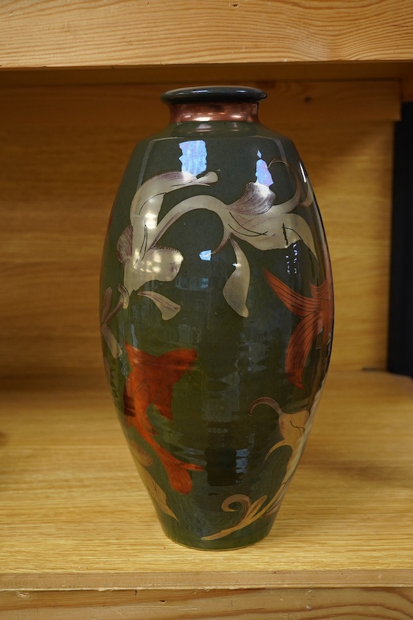 A Jonathan Chiswell Jones lustre vase hand painted with carp, signed to the base, 30cm high. Condition - good, firing crack to the base